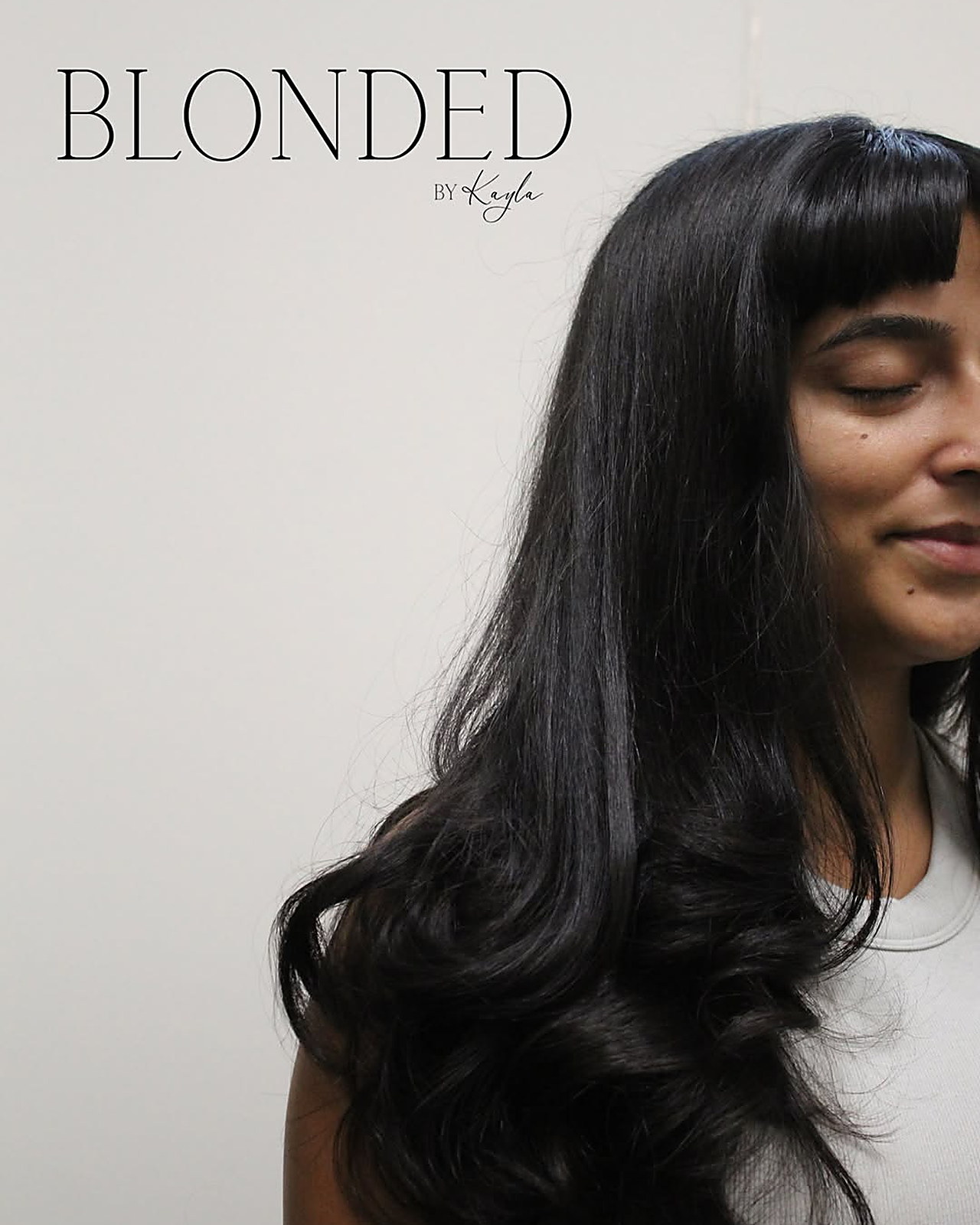 Layers with a pop of bangs — Blunt fringe on glossy black